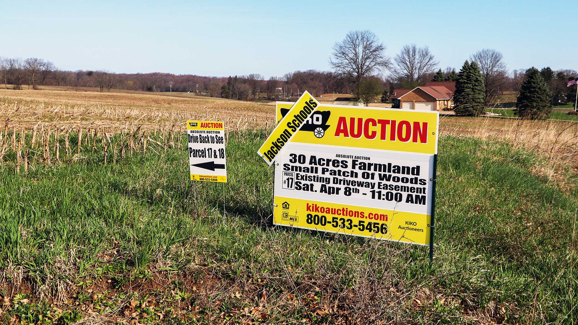 farm field for sale sign